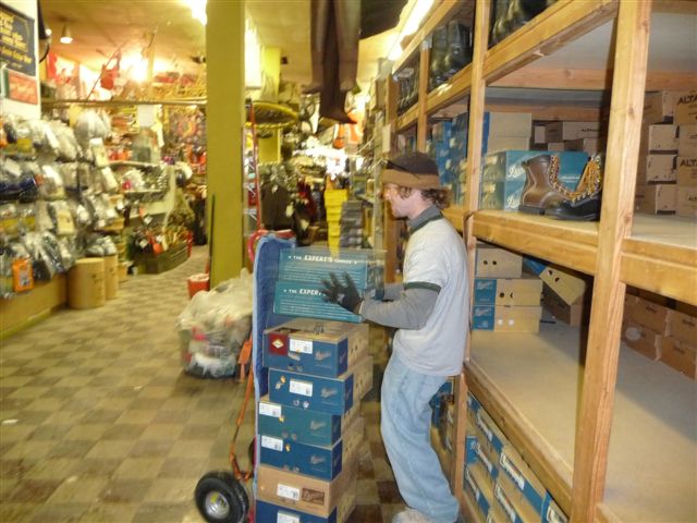 McKell Brothers loading stuff in old store